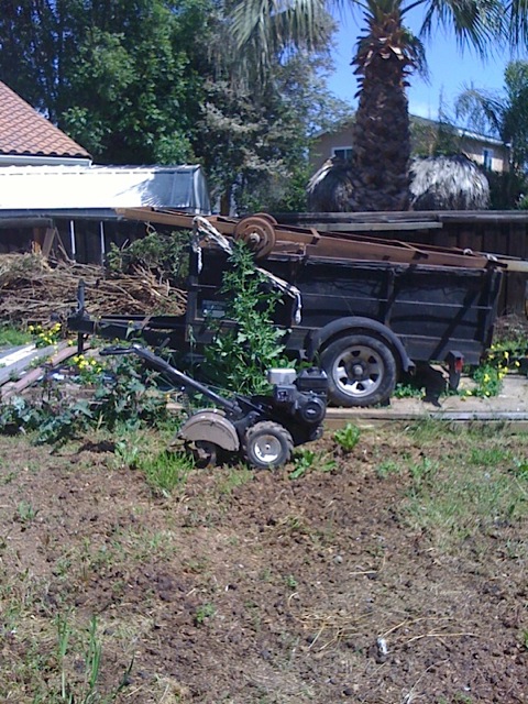 14 Inch rototiller and 8ft.x5ft.x4ft. Dump trailer.